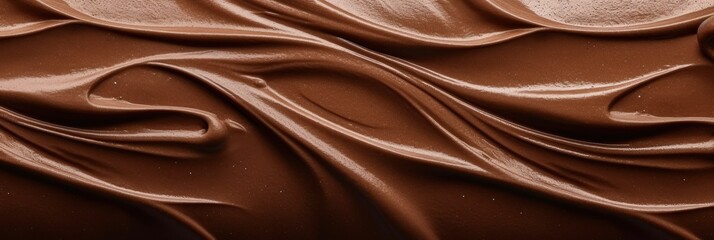 Fototapeta premium Close-Up View of Smooth Chocolate Texture with Rich Swirls and Depth, Perfect for Culinary and Dessert Creations