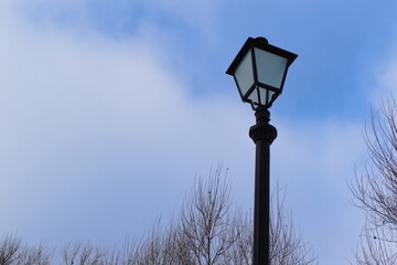 street lamp on blue sky