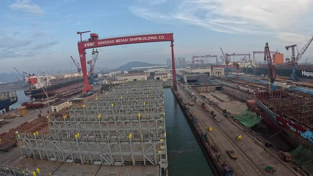 Qingdao, China - 07.26.2024 Timelapse of large container ship CMA CGM XIAMEN depart from Qingdao Beihai Dry Dock 
