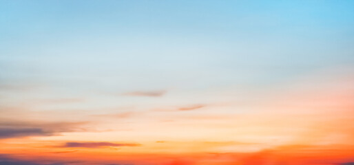 Sky Dusk Background,Sunset Dramatic Pink, Orange, Red,Yellow Sky, Cloud with golden sunlight over sea beach in evening summer,Nature landscape banner,Horizon Sunrise sky pastel blue,purple in morning