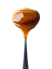 Spoon of caramel sauce