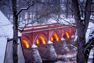 old brick bridge in winter, Kuldiga, Latvia
