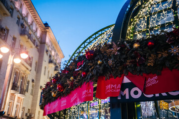 Fototapeta premium MOSCOW, RUSSIA - 12.21.2024: New Year's illumination at the festival site on Tverskaya Street