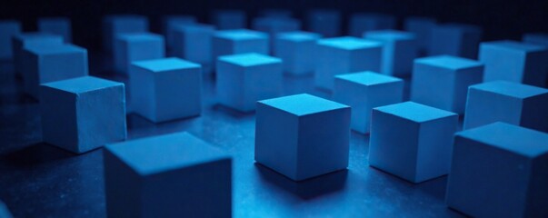 Naklejka premium Cubes with soft blue light emitted from within, scattered across a darkened space, dark, atmosphere