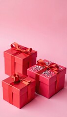 Fototapeta premium Pink background with three red gift boxes containing sequins, decoration, decorative items, gift boxes
