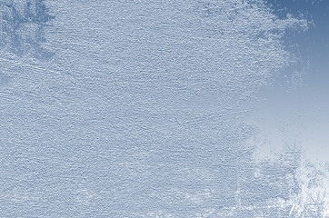 Snow-covered background on the ice surface close-up view from above