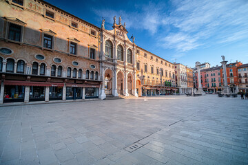 Fototapeta premium Sunrise in a well-known square Piazza dei Signori. in Italy in the Veneto region. Squares in the center of Vicenza.