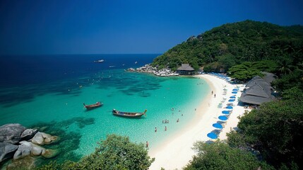 Fototapeta premium A secluded beach on Koh Samet, with lush greenery and clear water, perfect for a quiet escape.
