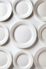 Plates arranged in a circle symbolize unity and shared experiences through food and community gatherings