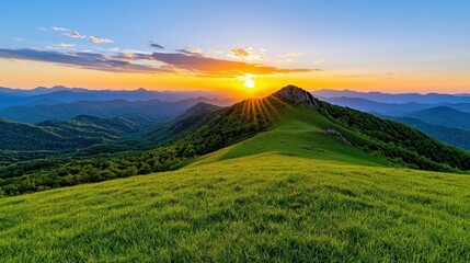 A photostock of a sunrise view of a misty valley with rolling hills, illuminated by warm golden light, symbolizing new beginnings and natural beauty. High Quality