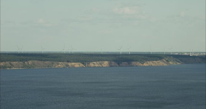 Volga river landscape with wind turbines