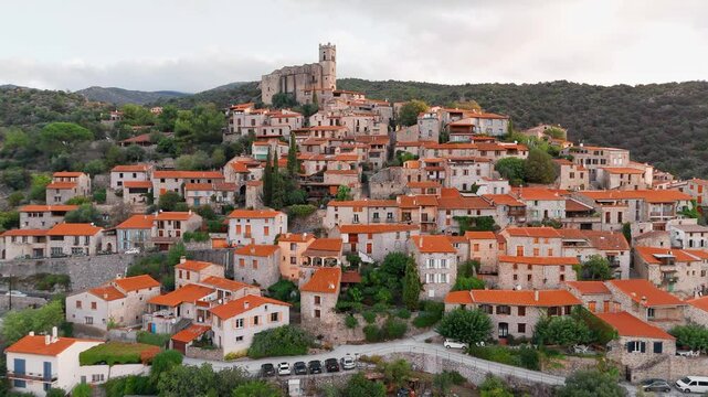 Aerial view of Eus, the medieval hilltop town in Pyrenees mountains, France. 