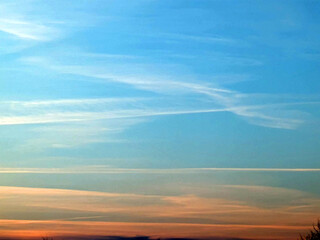 Gentle Cloud Lines in a Sunset Sky Evening