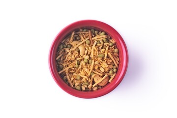 Directly above shot of Indian kashmiri mix snack food in bowl on white background. 