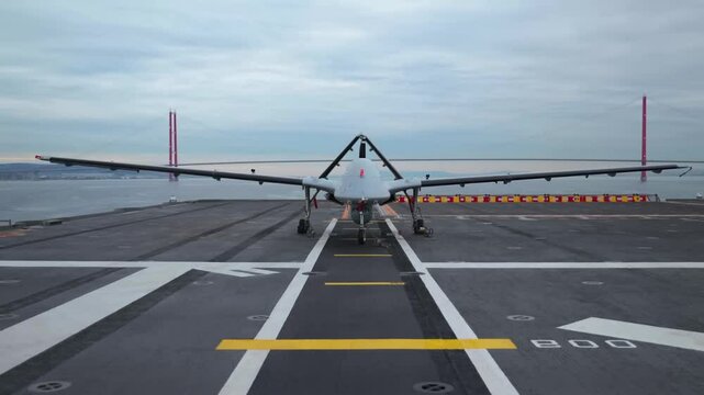 Edirne, Turkey - June 25 2024: Baykar plans to make supersonic variant of unmanned fighter jet Bayraktar TB3.Baykar Bayraktar TB3 Drone of Turkish Air Force on airport runway.