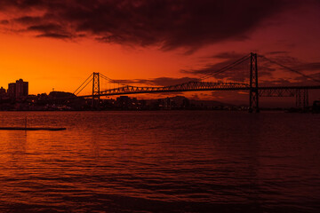 Old Hercilio luz cable bridge with sunset in Florianopolis