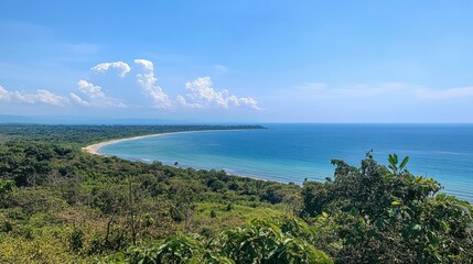 Obraz premium A scenic viewpoint on Koh Samet, overlooking the vast ocean with lush green tropical foliage surrounding the beach.