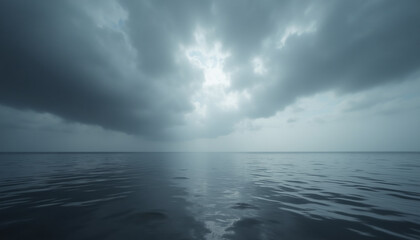 Dramatic cloudy sky over a calm ocean at twilight