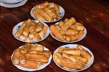 Fried snacks, crispy, arranged on a plate. Popular local food, suitable for breakfast or snacks, That Burmese people like to eat with sweet tea in the morning. (Youtiao, Yu Cha, Chinese breadstick) 