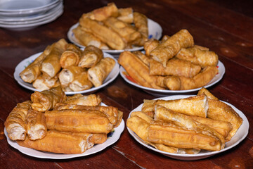 Fried snacks, crispy, arranged on a plate. Popular local food, suitable for breakfast or snacks, That Burmese people like to eat with sweet tea in the morning. (Youtiao, Yu Cha, Chinese breadstick) 