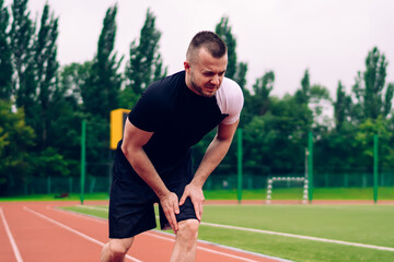 Sportsman getting hurt on track during training