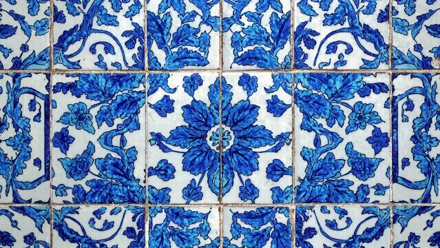 a background made of vintage tiles with blue ceramic designs