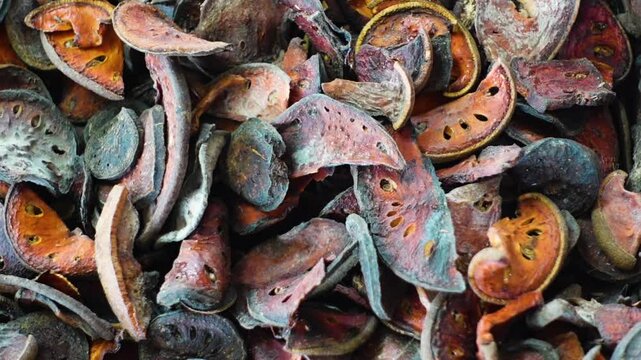 Raw dried Asta bel, Bel Shut, Shukno bel, Dry Aegle Marmelos slices. Raw material for making herbal medicines ready for sale.
