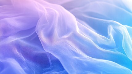 Obraz premium Pastel-colored fabric with soft folds and gradient hues.