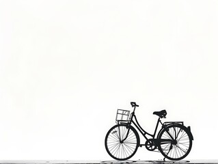 Obraz premium Silhouette of a bicycle on a road on a white background