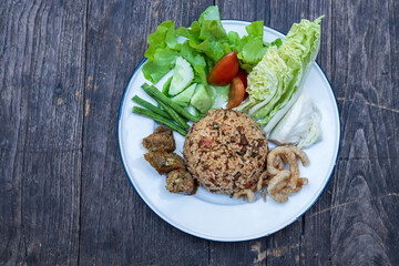 Fried rice with pork and egg. Food background.