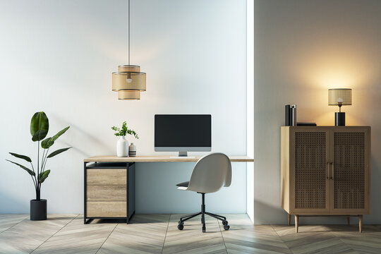 Modern home workspace with wooden desk and computer, elegant chair, plants, pendant lamp, cabinet, and warm lighting. 3D Rendering