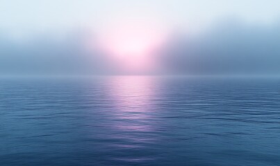 Obraz premium Pink sunrise over foggy ocean.
