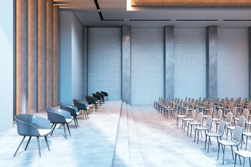 Spacious modern conference hall interior with empty seats, concrete walls, and bright lighting. Perfect for events and corporate meetings. 3D Rendering