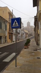 Road sign in the middle of a street in the city of Palermo