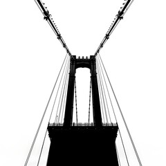 Obraz premium Silhouette of a bridge tower with suspension cables on a white background