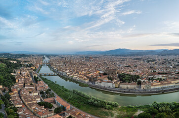 View of the old city of Florence and the Arno River at sunrise