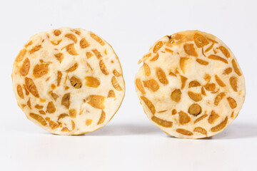 Two Slices of Tempeh: A Close-Up Look at the Texture and Color of This Popular Indonesian Food