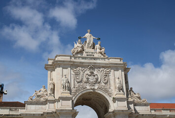Obraz premium Close-up of the Rua Augusta Arch, Triumphal arch on the Commerce square, Lisbon, Portugal. An inscription in Latin, translated into English as 