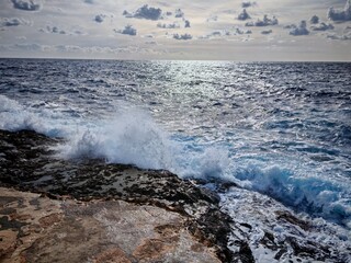 waves breaking on the rocks