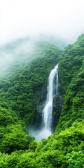Majestic Waterfall Cascading Through Lush Green Forest Surrounded by Vibrant Flora and Mist Creating a Tranquil and Enchanting Natural Scene