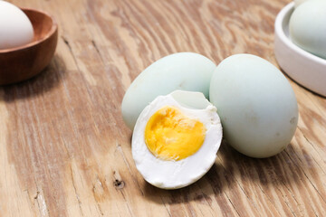 Close-up of Salted Duck Eggs on Wooden Table