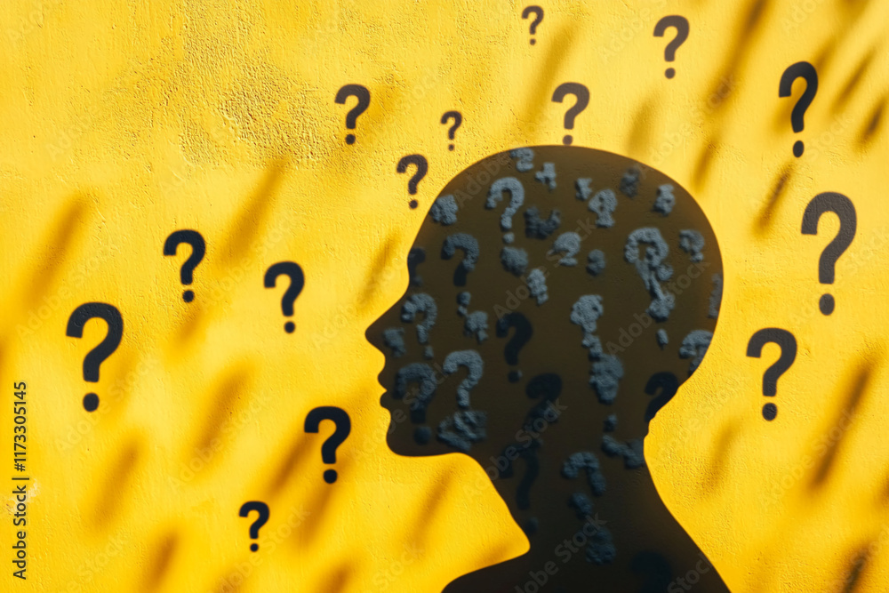 Poster abstract silhouette of a head with question marks on a textured yellow background