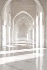 A long, narrow hallway with white pillars. The pillars are arched and the floor is white
