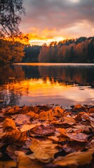 Autumn leaves glisten by the tranquil lake at sunset near the forest's edge