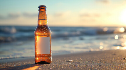 Cold beer bottle on beach sand at sunset with ocean waves