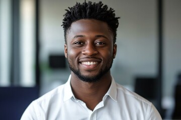 Smiling African Man in Office Setting
