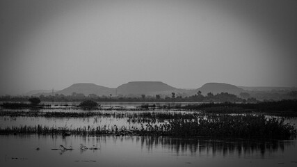 Three Sisters formation from across the Niger River