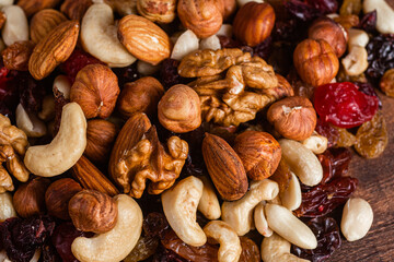 Mixture of nuts and dried fruits close-up.