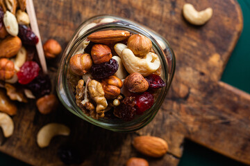 Mixture of nuts and dried fruits close-up.