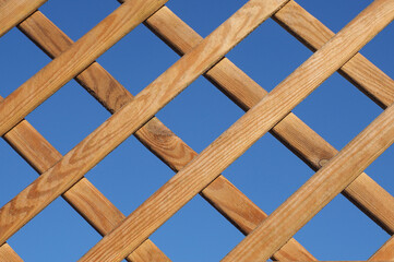 decorative fencing made of brown wood.